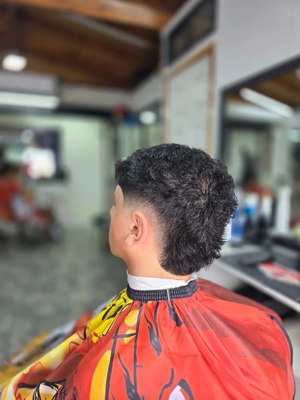 Corte: rizos con degradado